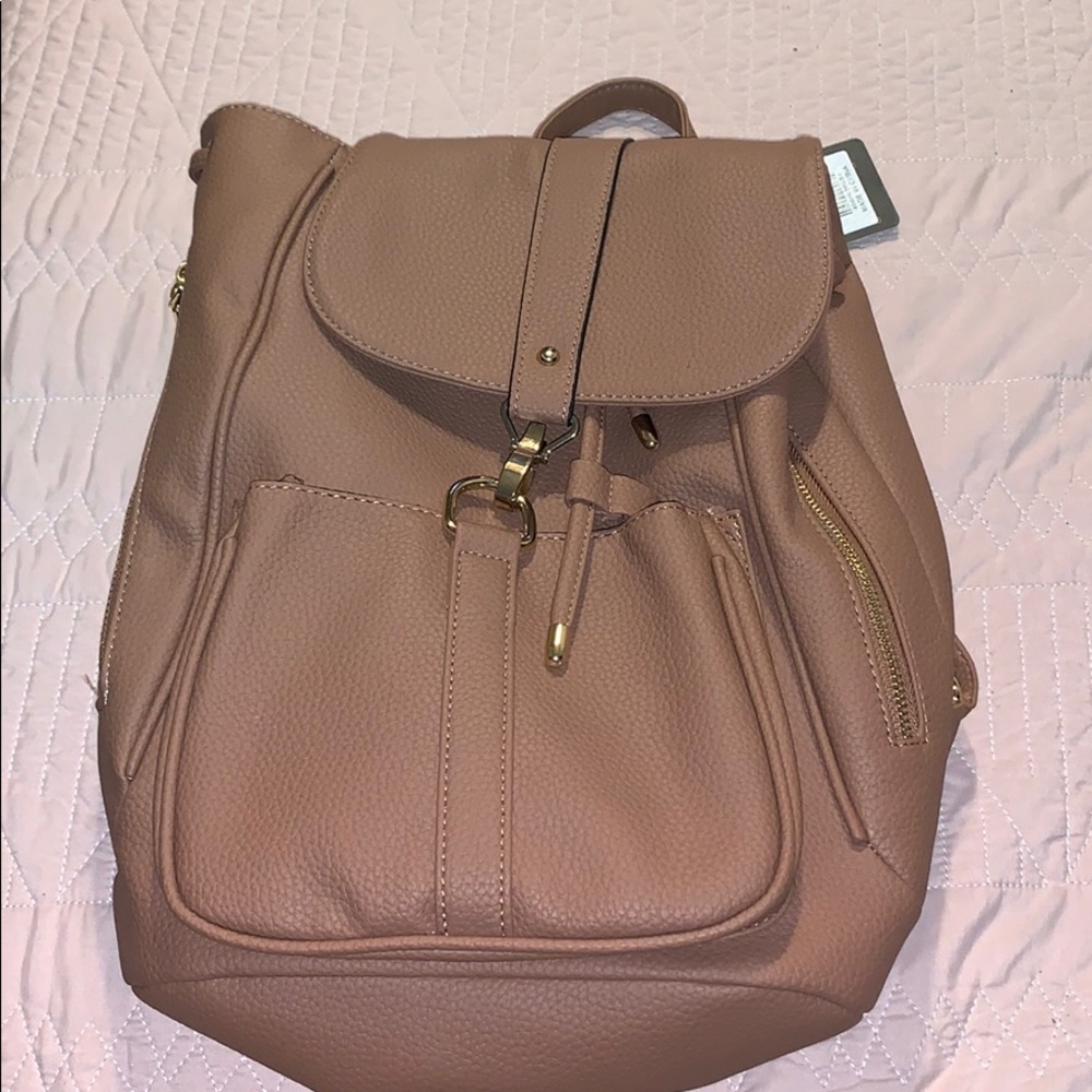Brand new dusty pink bagpack/purse
